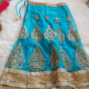 Party wear Lehenga and golden blouse